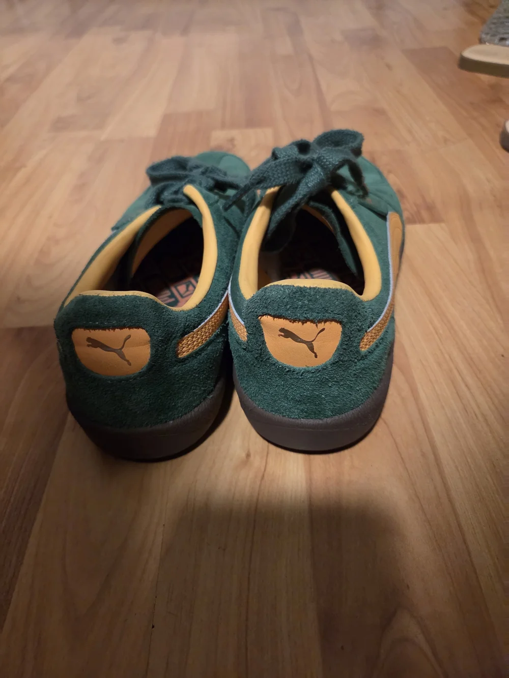 Puma Suede Sneakers in Green with Gold Accents